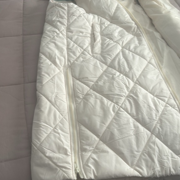 Off white/ivory long puffer vest. Hits mid thigh. - Picture 3 of 5